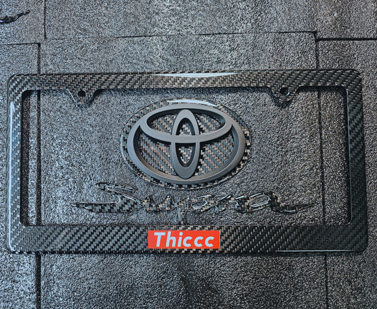 THICCC TWILL CARBON FIBER LICENSE PLATE FRAME