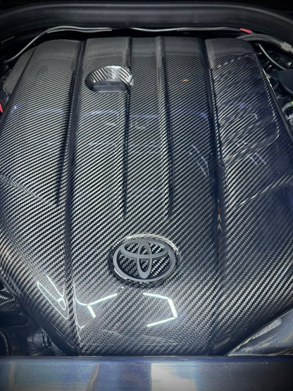 Carbon fiber engine badge